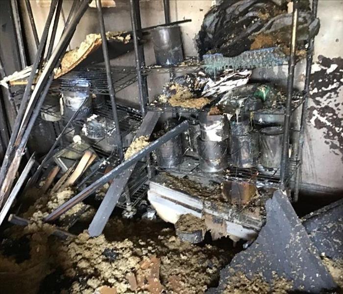 contents from garage soiled in debris after fire